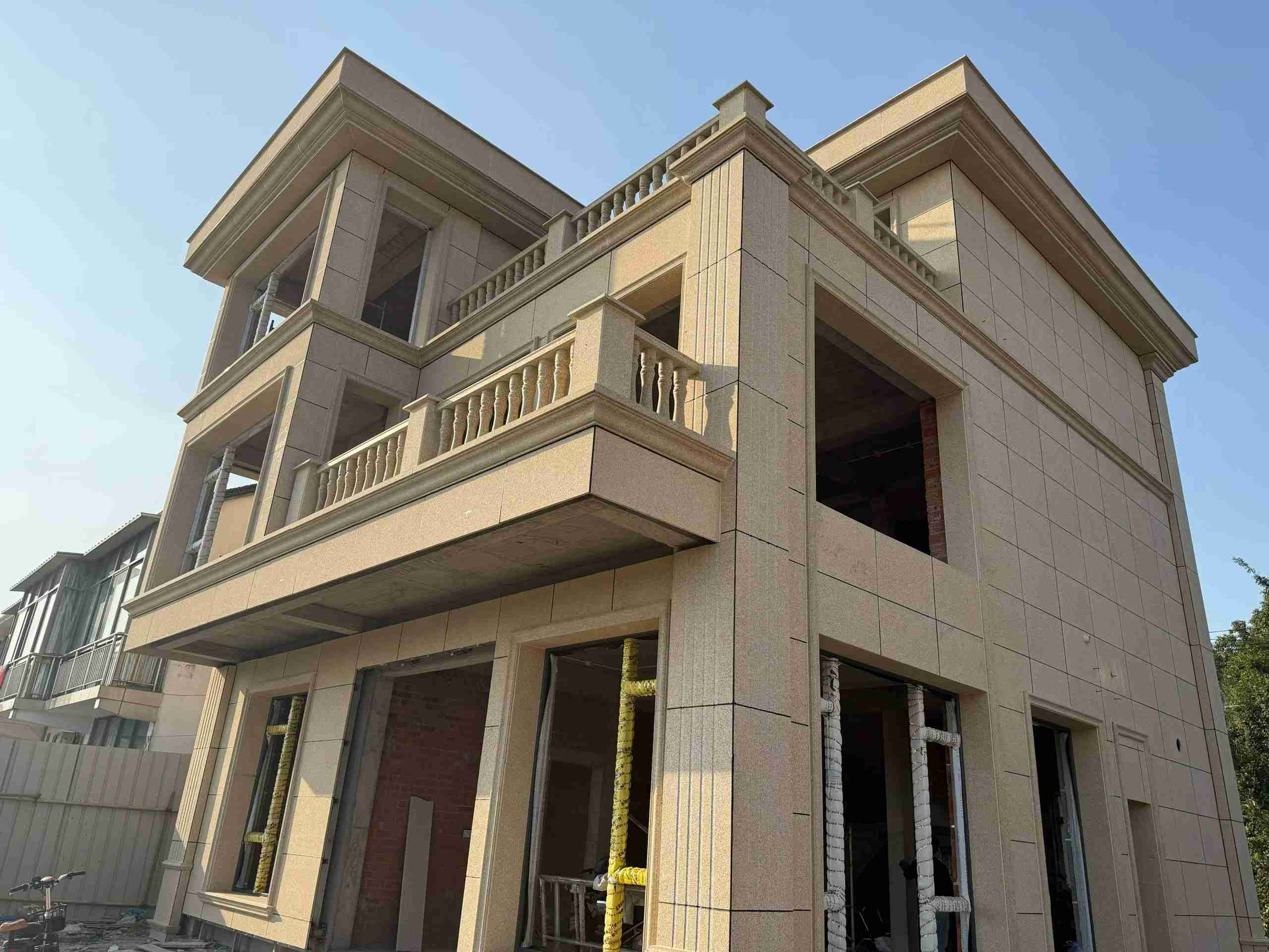 潮州 黄金麻花岗岩石材荔枝面外墙干挂效果展示